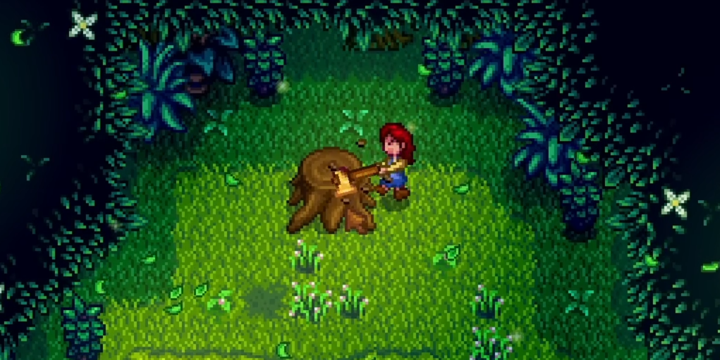 Player chopping a large hardwood stump in the Secret Woods to gain foraging XP in Stardew Valley