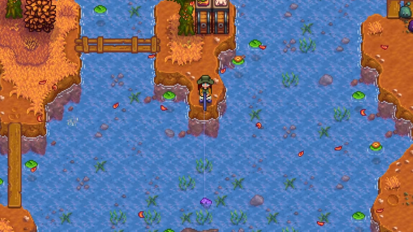 Player casting fishing line far from shore in Stardew Valley to reach higher fishing zone