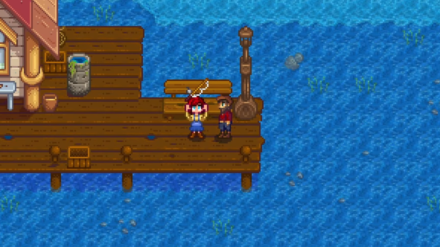 Willy giving the Bamboo Pole to the player on the beach dock in Stardew Valley