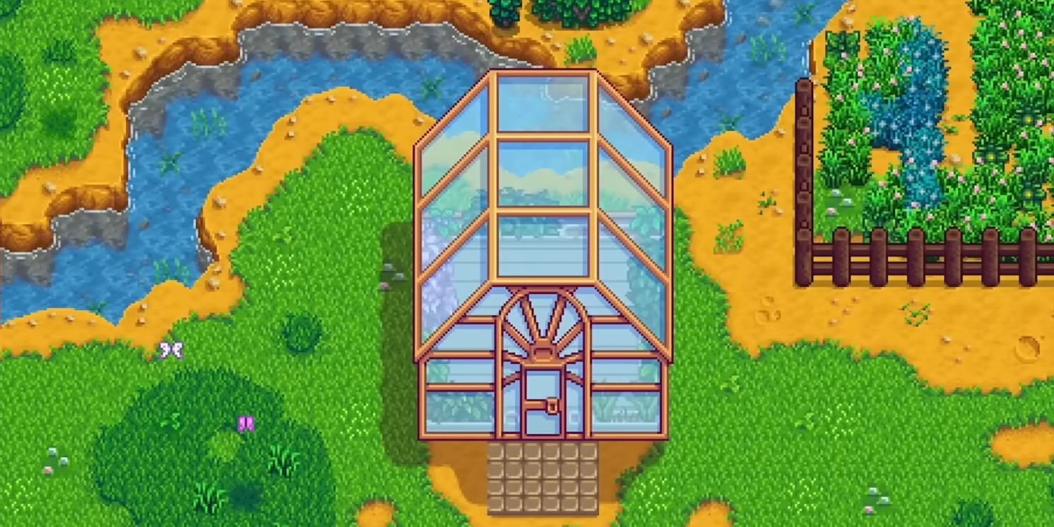 Fully restored greenhouse building placed on the farm in Stardew Valley