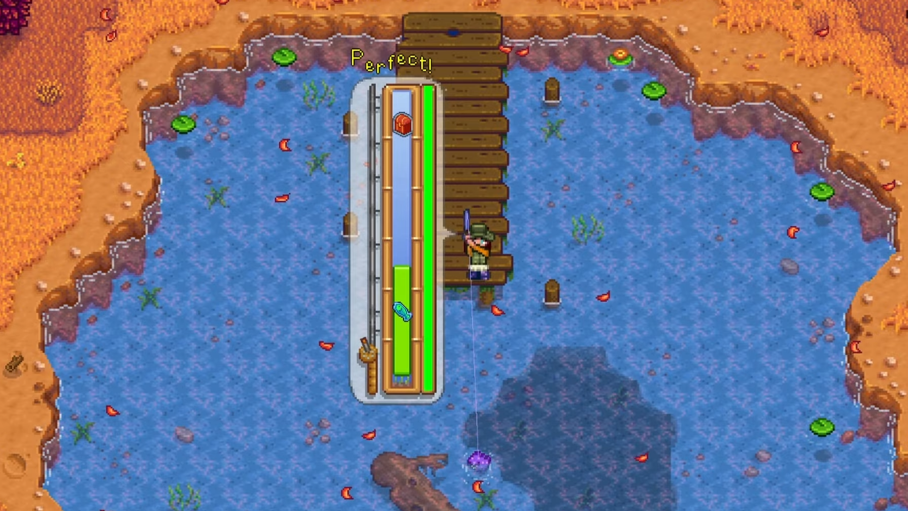 Perfect catch screen in Stardew Valley fishing mini-game showing full green progress bar